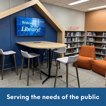 library meeting space with chairs and table and tv with text: Serving the needs of the public.