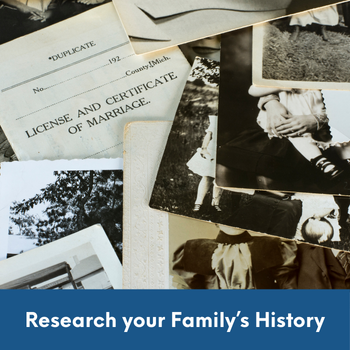old photographs and family records spread out on a table with text: Research your family's history.