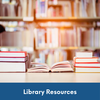 books on table in front of a bookshelf with text: Library resources.