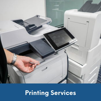 person standing at printer grabbing copy with text: Printing services.